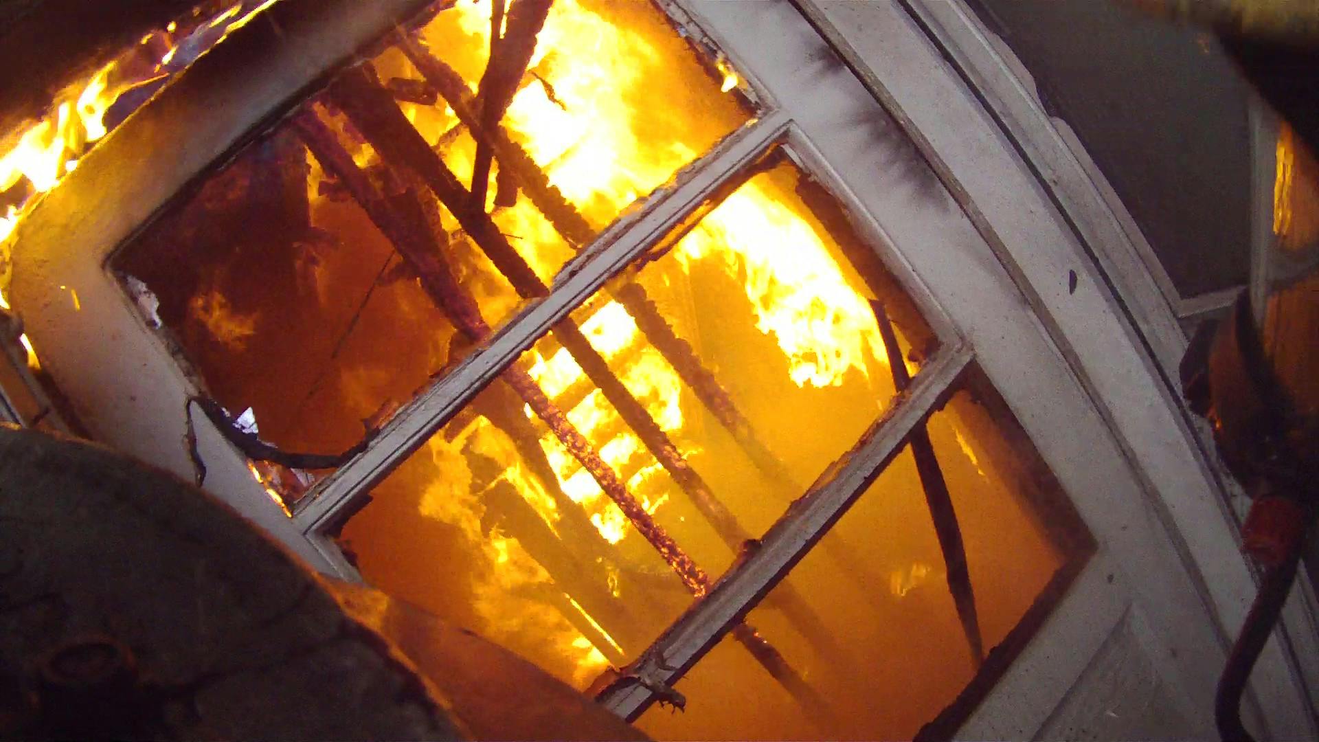 fire department basement fire operations from a firefighter helmet cam
