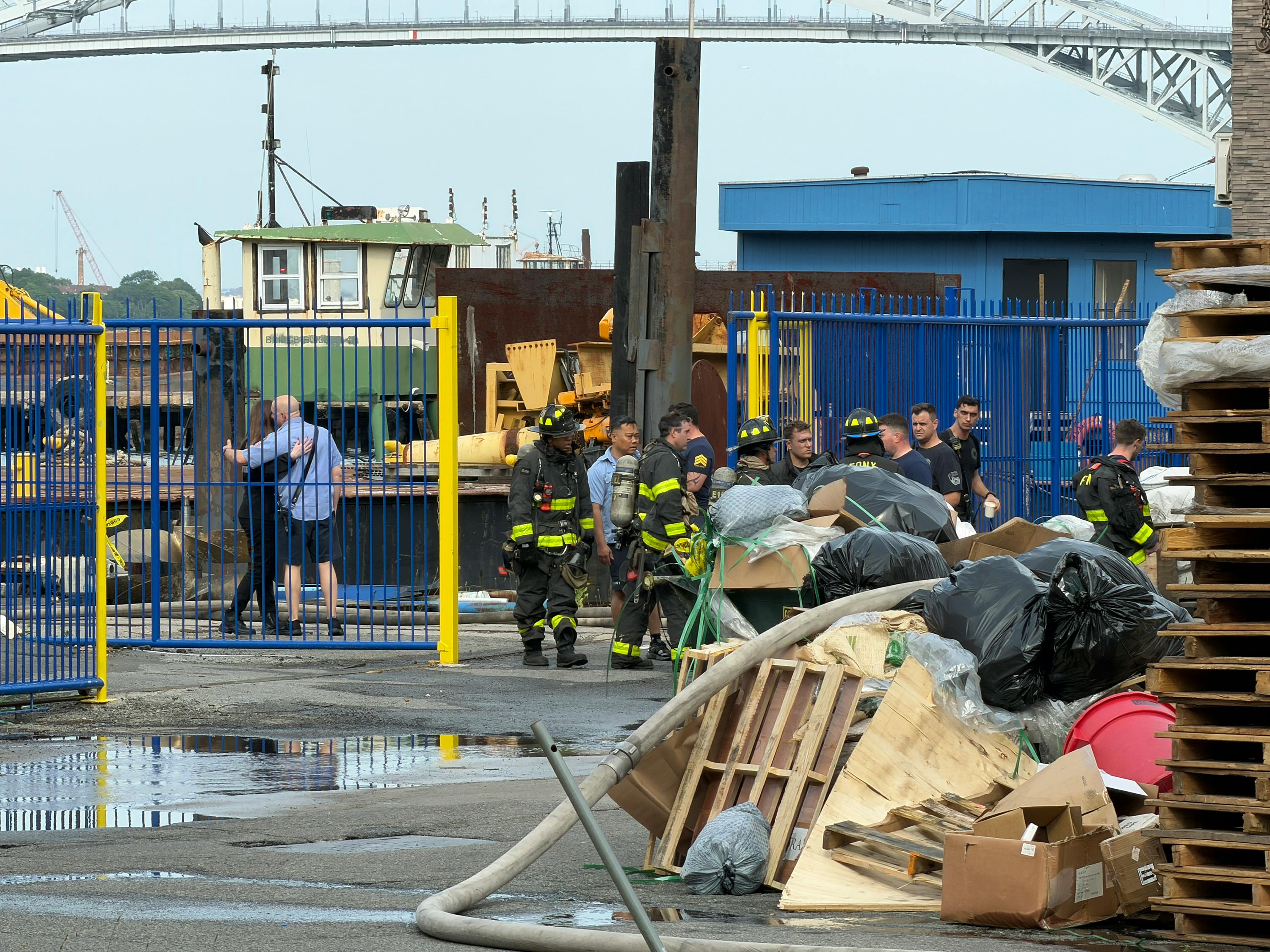 FDNY crews at the scene of an explosion and fire at a shipyard on Richmond Terrace, Staten Island, where 13 firefighters and two EMS members were injured Friday.