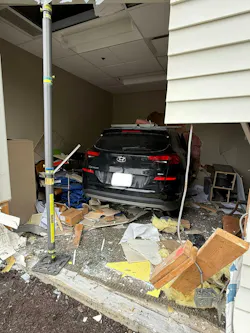 Firefighters used hydraulic rescue tools to free the woman, who was trapped beneath the vehicle. Firefighters used hydraulic rescue tools to free the woman, who was trapped beneath the vehicle.