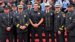 Justin Tomlin (center) following his graduation from the Connecticut Fire Academy. He served in the U.S. Army in both Iraq and Afghanistan before joining law enforcement but entered the fire service at age 41. Justin Tomlin (center) following his graduation from the Connecticut Fire Academy. He served in the U.S. Army in both Iraq and Afghanistan before joining law enforcement but entered the fire service at age 41.