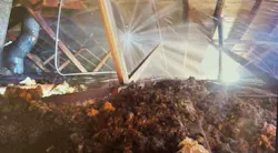 sprinkler head-type spray produced in attic that's on fire by a piercing nozzle