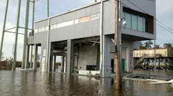 fire station built to withstand a natural disaster standing in flood waters