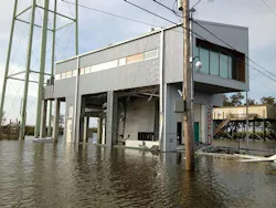 fire station built to withstand a natural disaster standing in flood waters