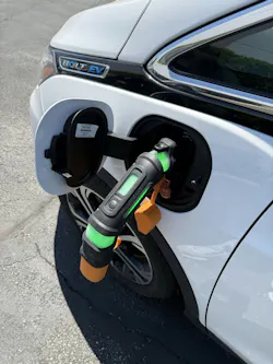 Midtronics xIM-100 EV Immobilizer device inserted into electric vehicle charging port