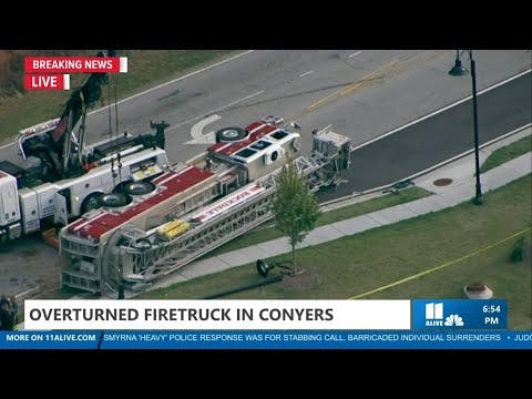 Firefighter dead after fire truck overturns in Conyers