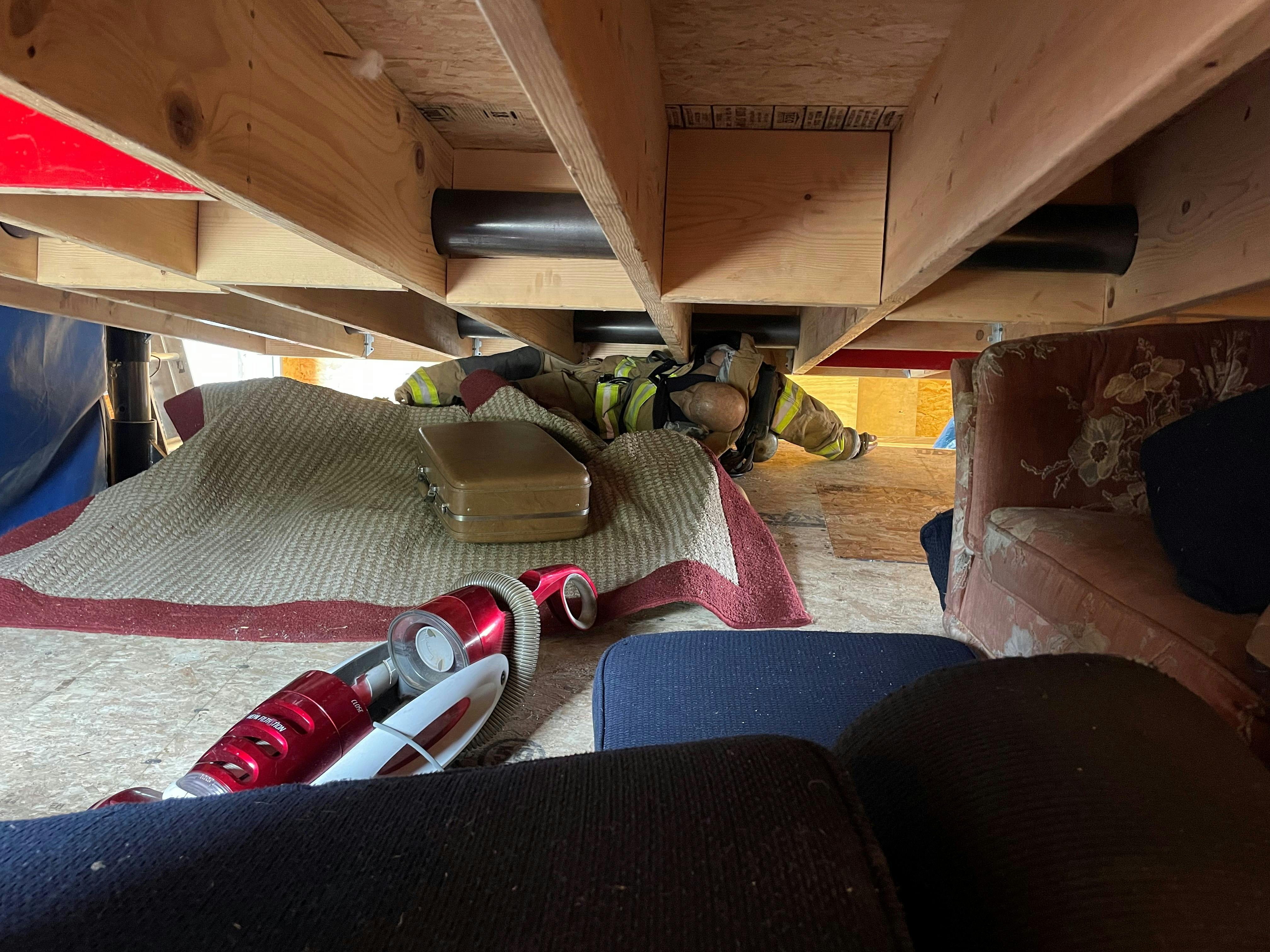 manikin trapped under collapsed floor for rescue training