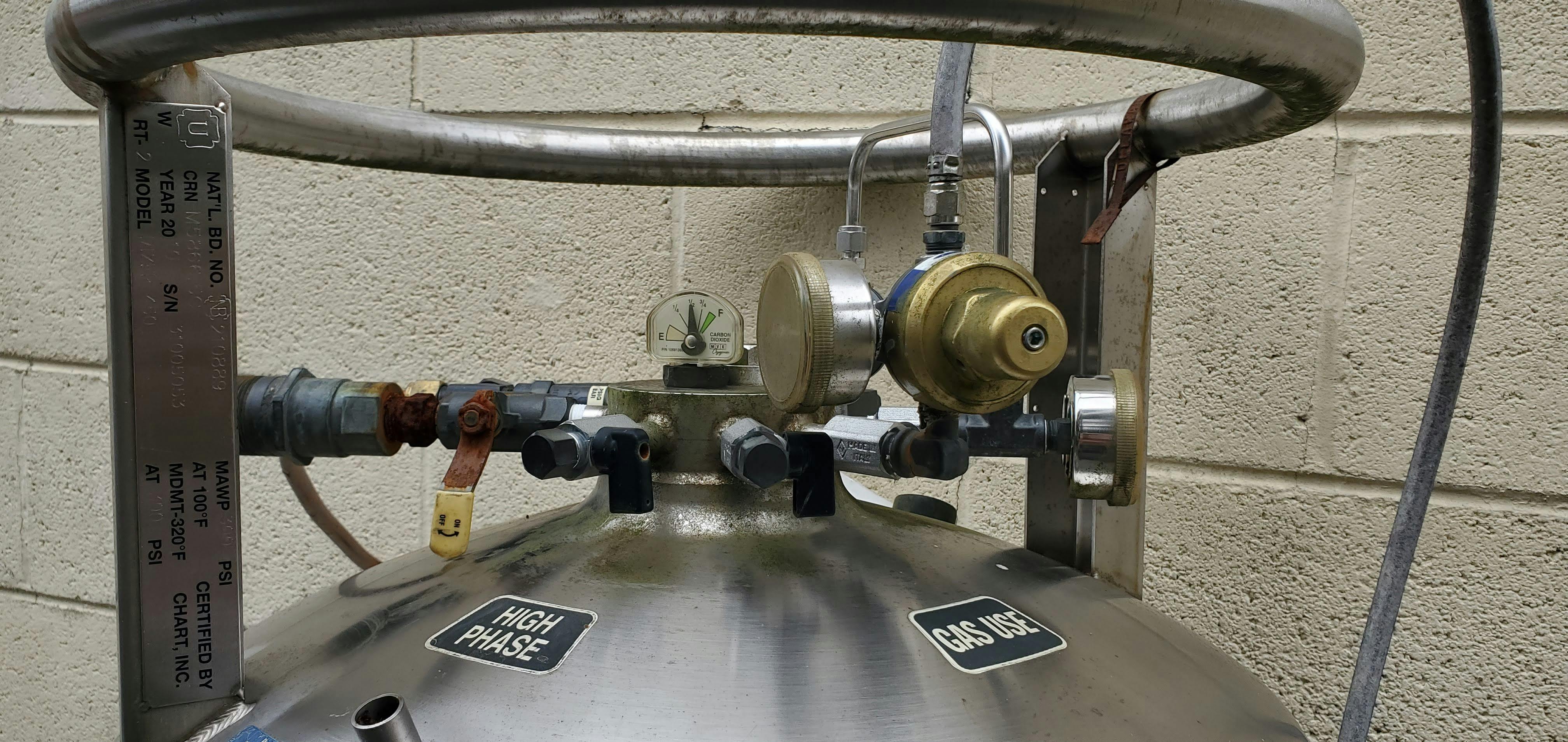 top of carbon dioxide dewar container with multiple valves