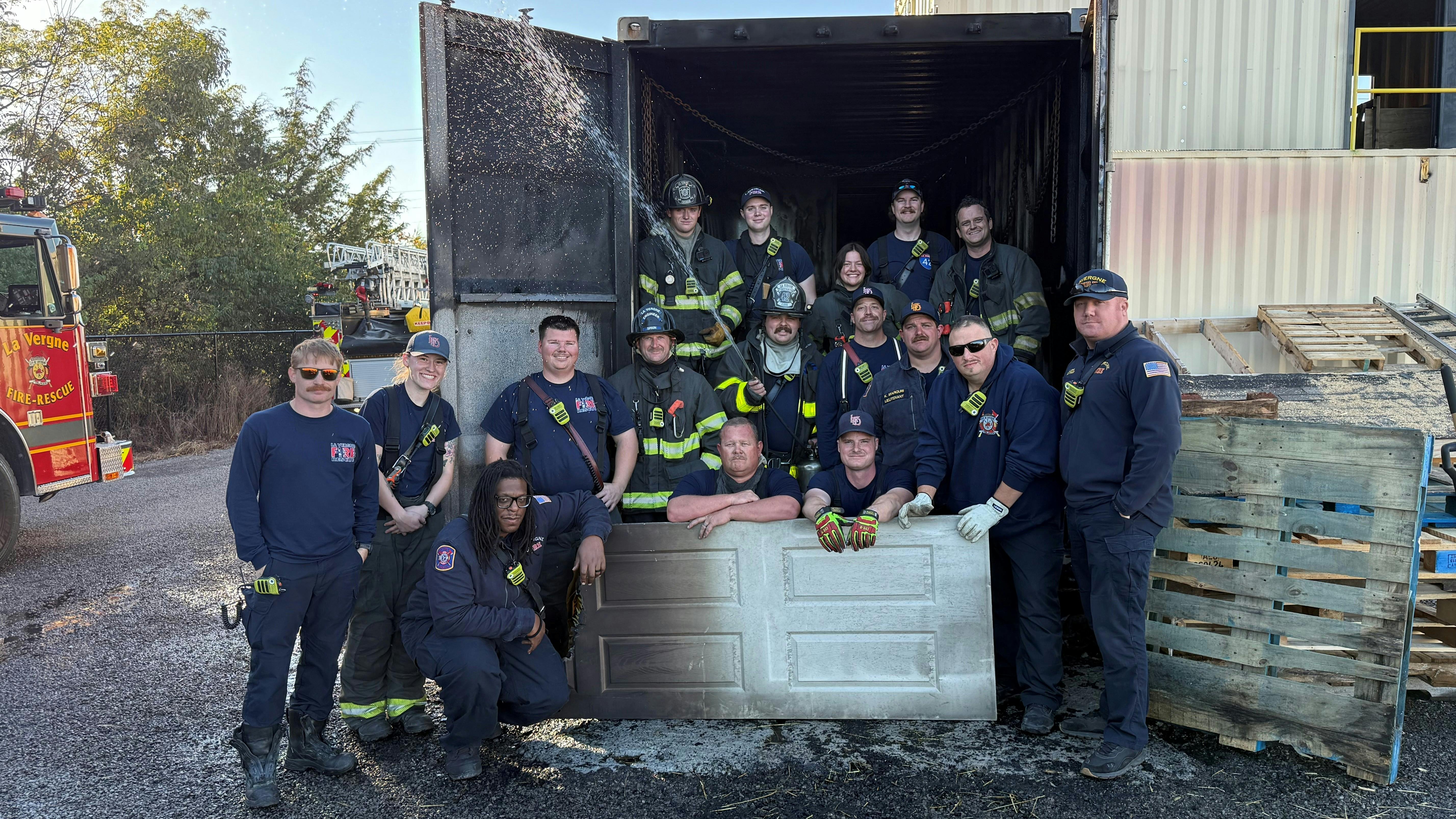 firefighters and fire department company officers at a training