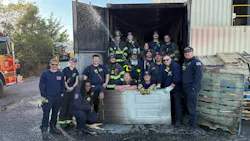 firefighters and fire department company officers at a training