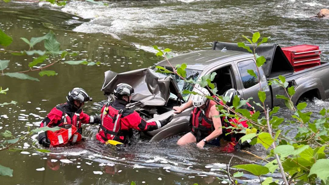 Firefighters Rescue Driver After Pickup Ends Up In Springfield Vt River