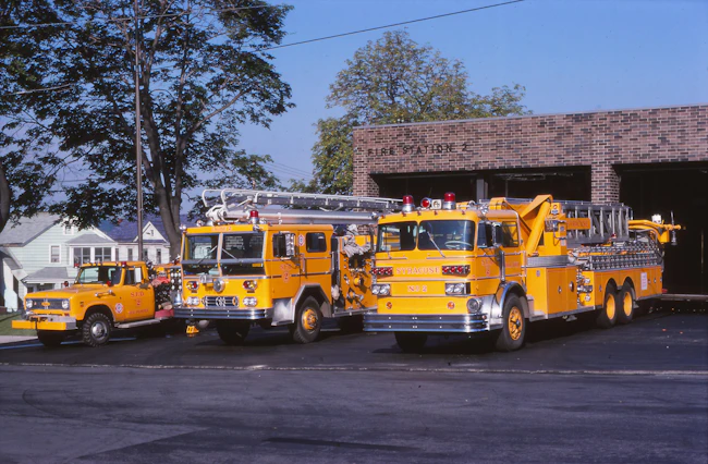 In 1977, Syracuse, NY, Fire Department (SFD) Station 2&rsquo;s apparatus were (from left to right) Mini 2 (a 1973 International Pierce), Engine 2 (a 1973 Ward LaFrance 50-foot Telesquirt) and Truck 2 (a 1973 Sutphen 85-foot aerial tower). SFD truck companies didn&rsquo;t operate as quints and carried 233 feet of ground ladders.
