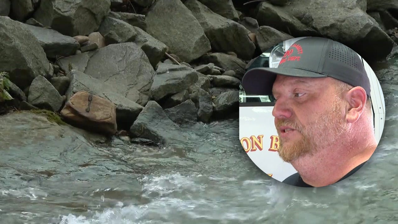 Wharton, WV, Fire Chief Drives Across Trestle During Flood Rescue