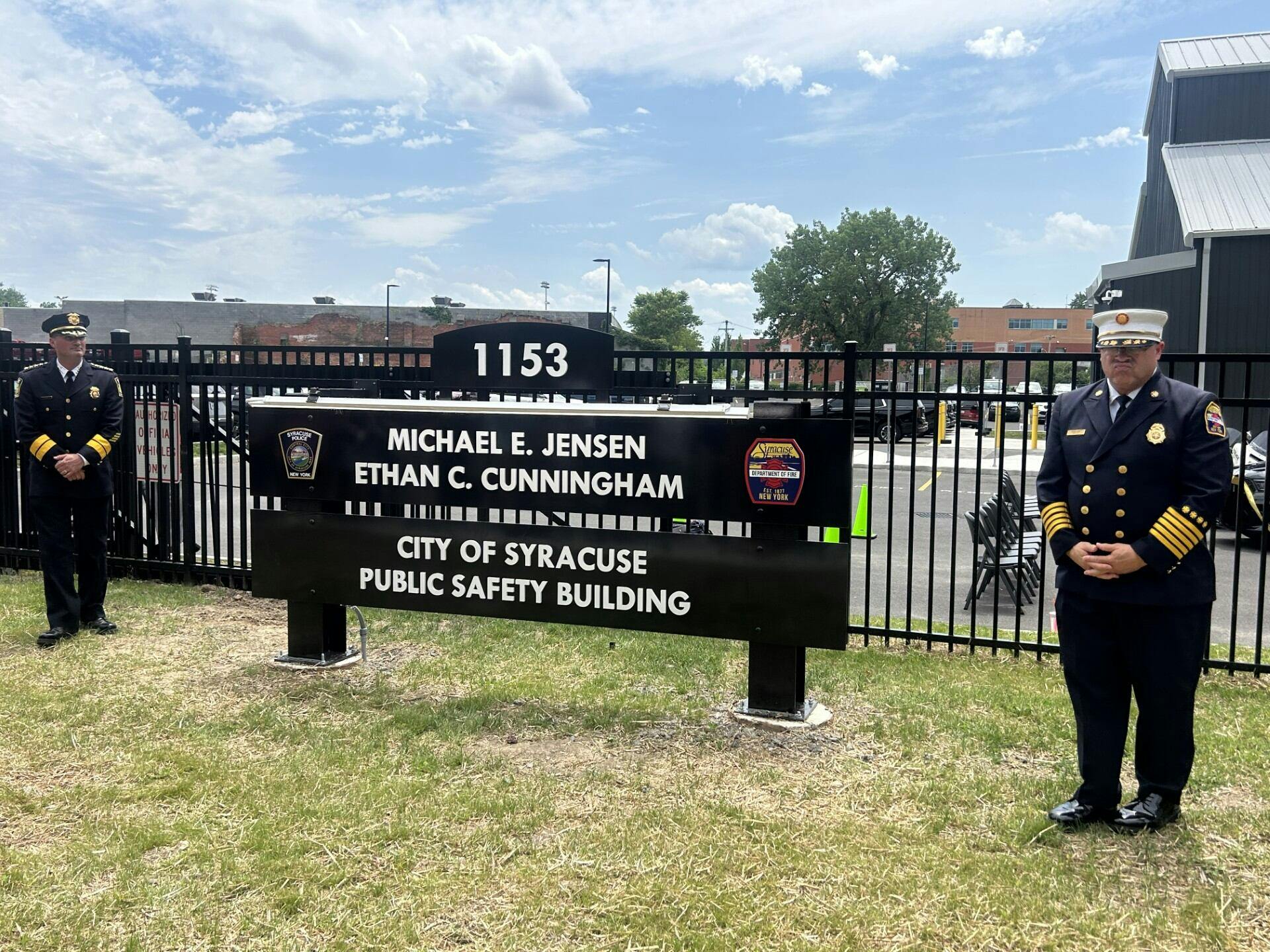 Syracuse Police Chief Mark Rusin (left) and Fire Chief Michael Monds participated in the dedication Tuesday.