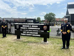 Syracuse Police Chief Mark Rusin (left) and Fire Chief Michael Monds participated in the dedication Tuesday.