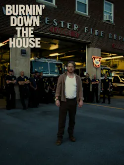 Filmmaker Tommy Jay Dwyer, who led the efforts behind 'Burnin' Down the House' poses outside a Worcester, MA, Fire Station that's featured in the film.