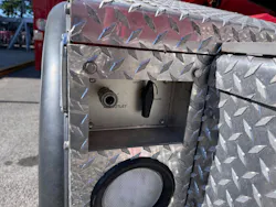 onboard air line quick connect on tiller fire vehicle recessed into the body