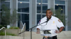 fire department chief speaking to the community and the media