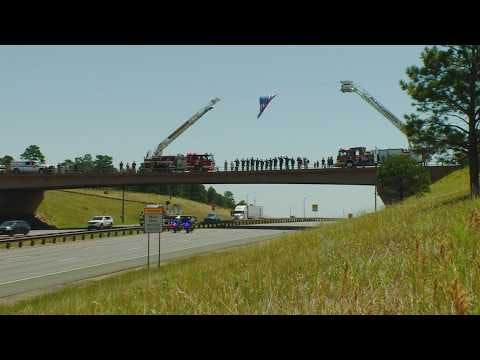 Procession honors pilot who died battling Colorado wildfire