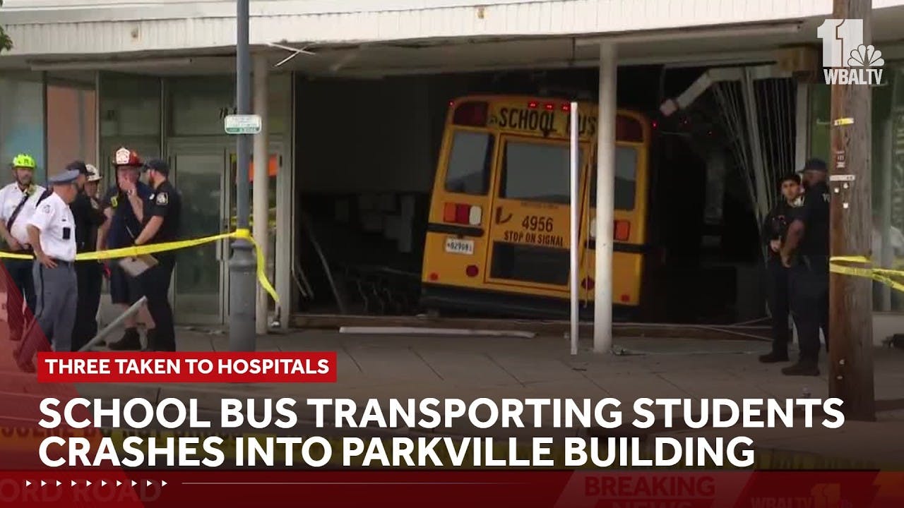 School bus crashes into Parkville building, 3 taken to hospitals