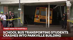 School bus crashes into Parkville building, 3 taken to hospitals