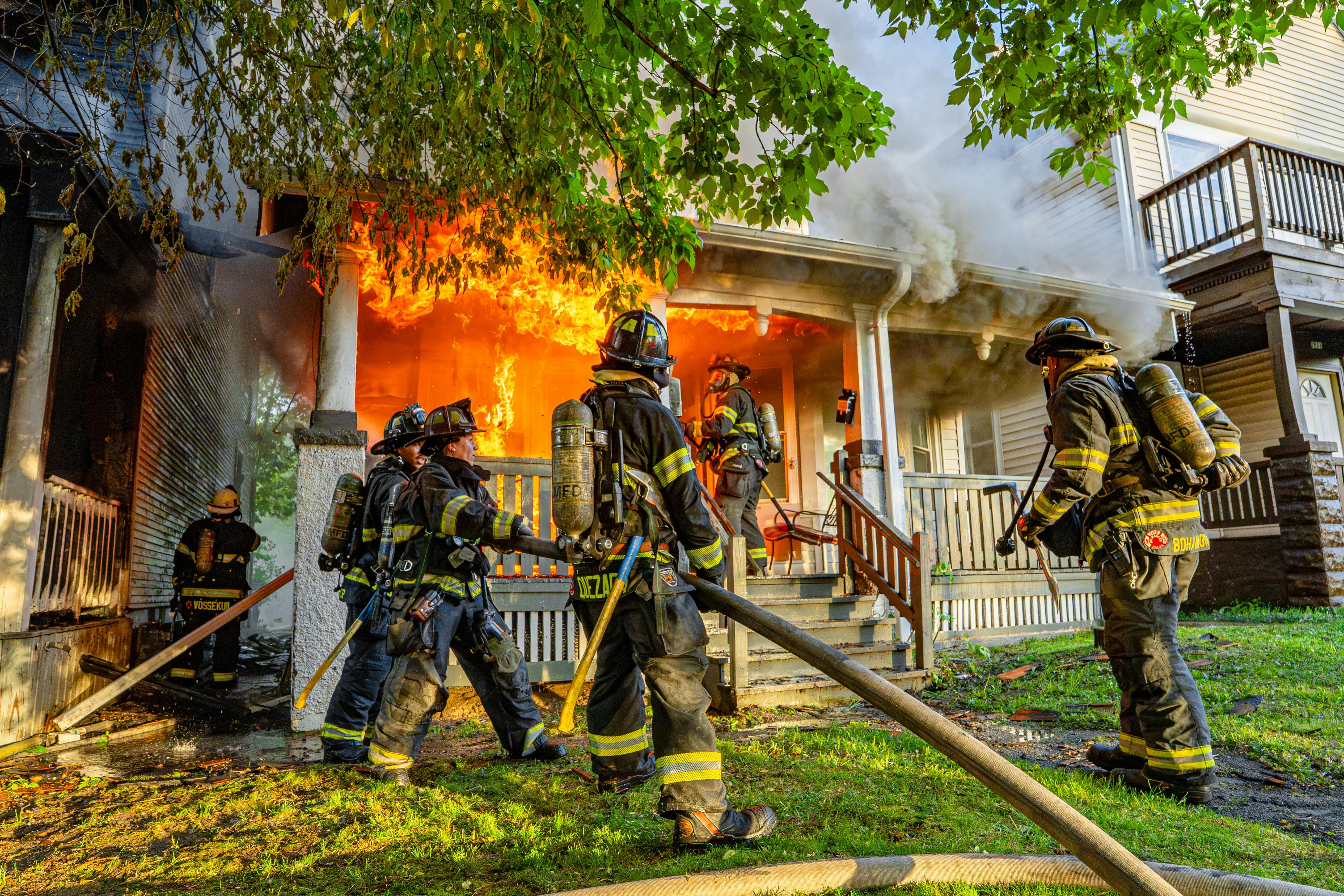 firefighters house fire exposures Milwaukee Scott Carnahan