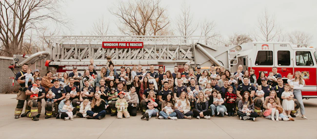 A coordinated photoshoot captured the Windsor Fire & Rescue Services' strong family atmosphere, involving over firefighters, spouses and children.