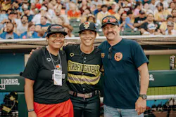 Valerie Perez (center) was able to play a role in making one of her former captains at the Corpus Christi Fire Department, Brandon Lott (right), the firefighter of the night.