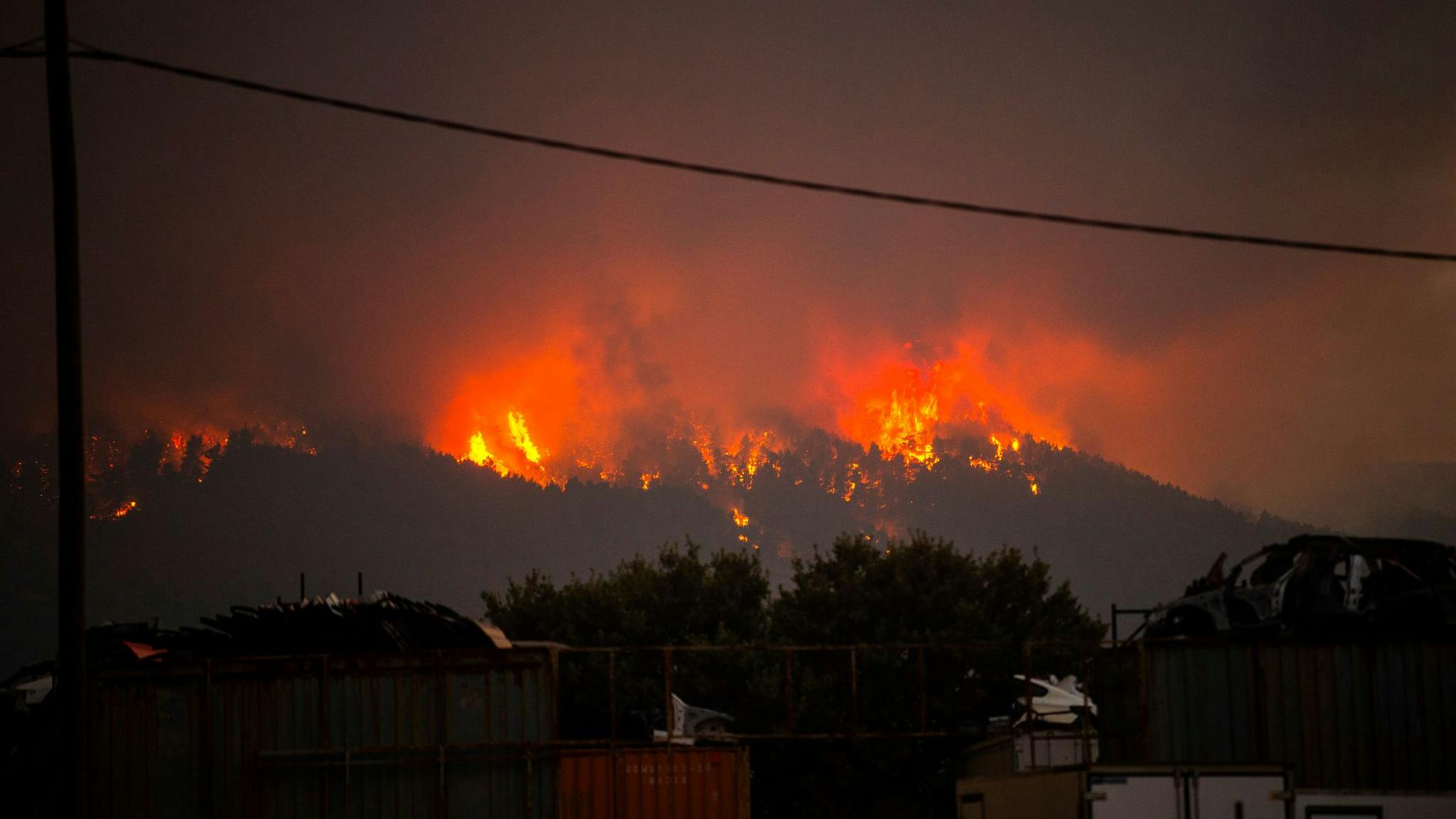 Officials said one firefighter was found unconscious at a fire in Ageranos while two died at a fire in Crete.