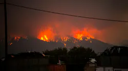 Officials said one firefighter was found unconscious at a fire in Ageranos while two died at a fire in Crete.