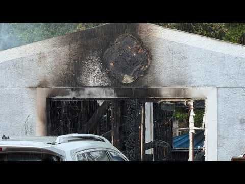 Firefighter suffers medical emergency while fighting a house fire in Sarasota
