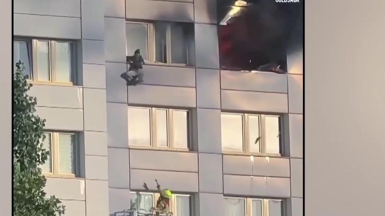 Woman jumps to escape Berlin high-rise fire