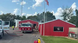Cuba firefighters ran into the smokey station to get apparatus and equipment out.