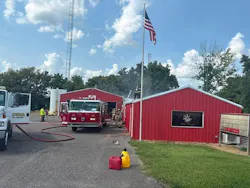 Cuba firefighters ran into the smokey station to get apparatus and equipment out.