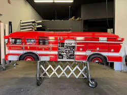 The casket is wrapped as Saugus Engine 3, where Drella worked as a lieutenant before he passed away from occupational cancer.