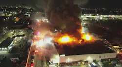 drone view of commercial building fire