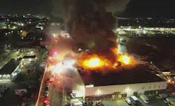 drone view of commercial building fire