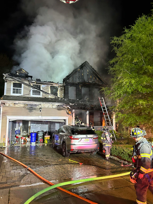 house that caught fire showing areas of collapse caused by heat and flames