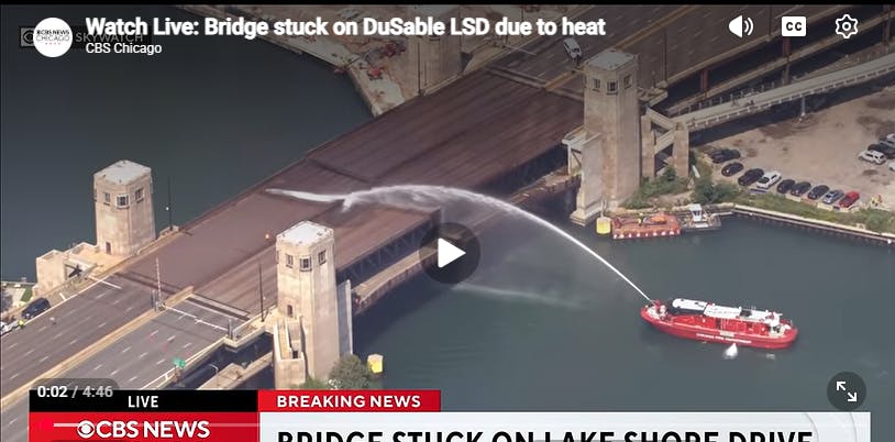 Chicago Firefighters Spray Swollen, Stuck Bridge
