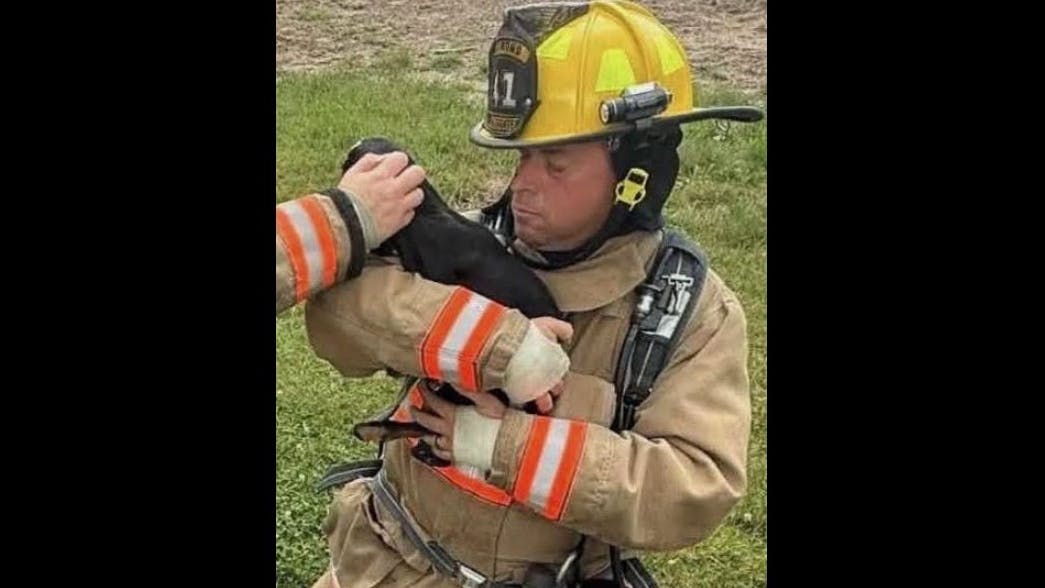 Raymond firefighter Eric Phillips, 44, died while responding to an emergency Friday.