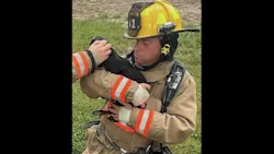 Raymond firefighter Eric Phillips, 44, died while responding to an emergency Friday.