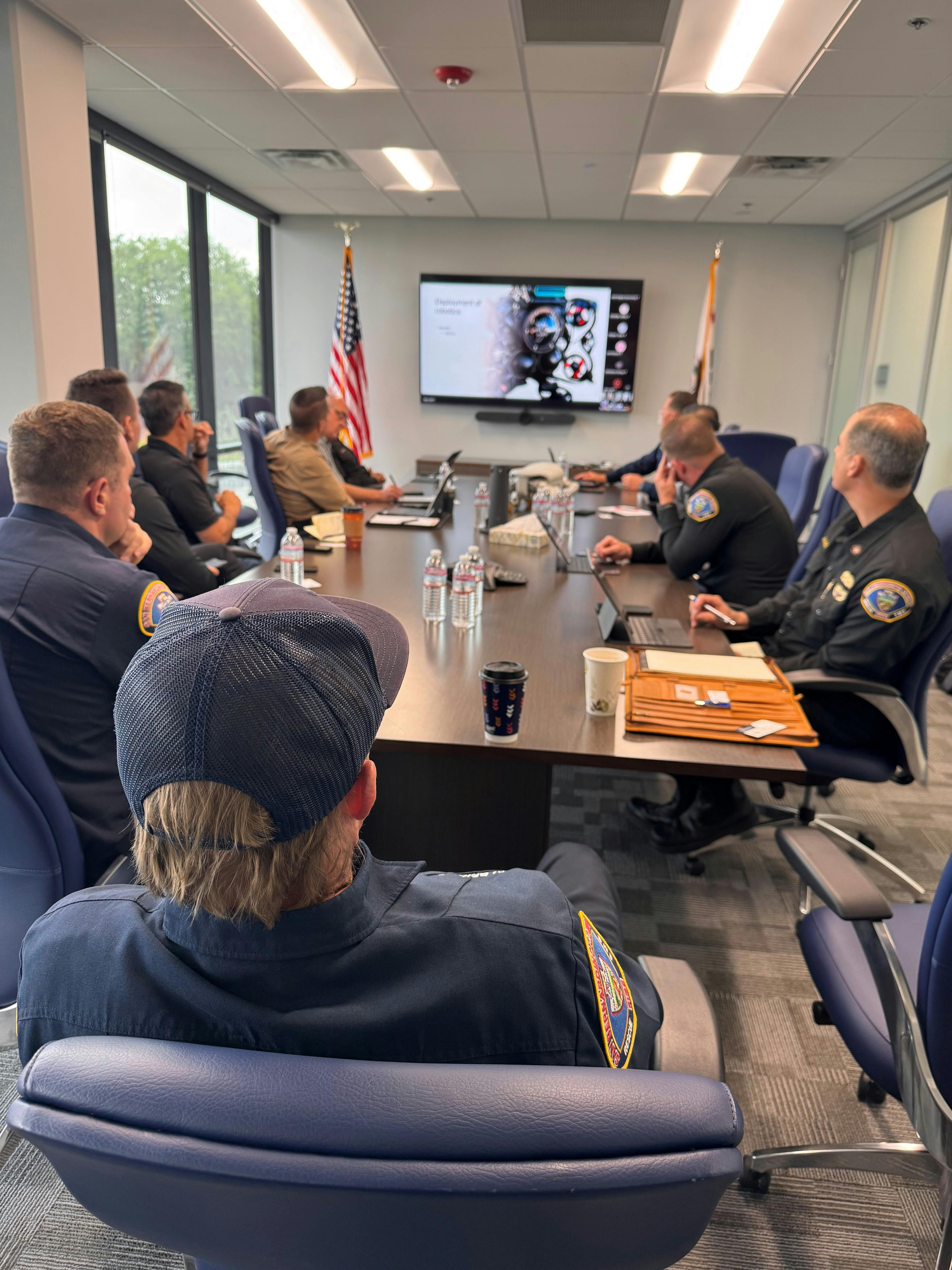 fire department leaders meeting with municipal planning members regarding smart cities technology