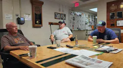 Retired Alexandria Firefighter Scott Morgan, left, talks about the 25th 9/11 anniversary ceremony at the Independent Hose Company with Mark Nelson and Eric Whitmore, also retired from Alexandria Fire Department, who was at the Pentagon.
