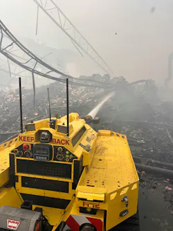 Los Angeles City Fire Department firefighting robot putting out hot spots at industrial fire