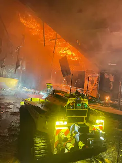 Los Angeles City Fire Department firefighting robot knocking down fire in area where a collapse could occur