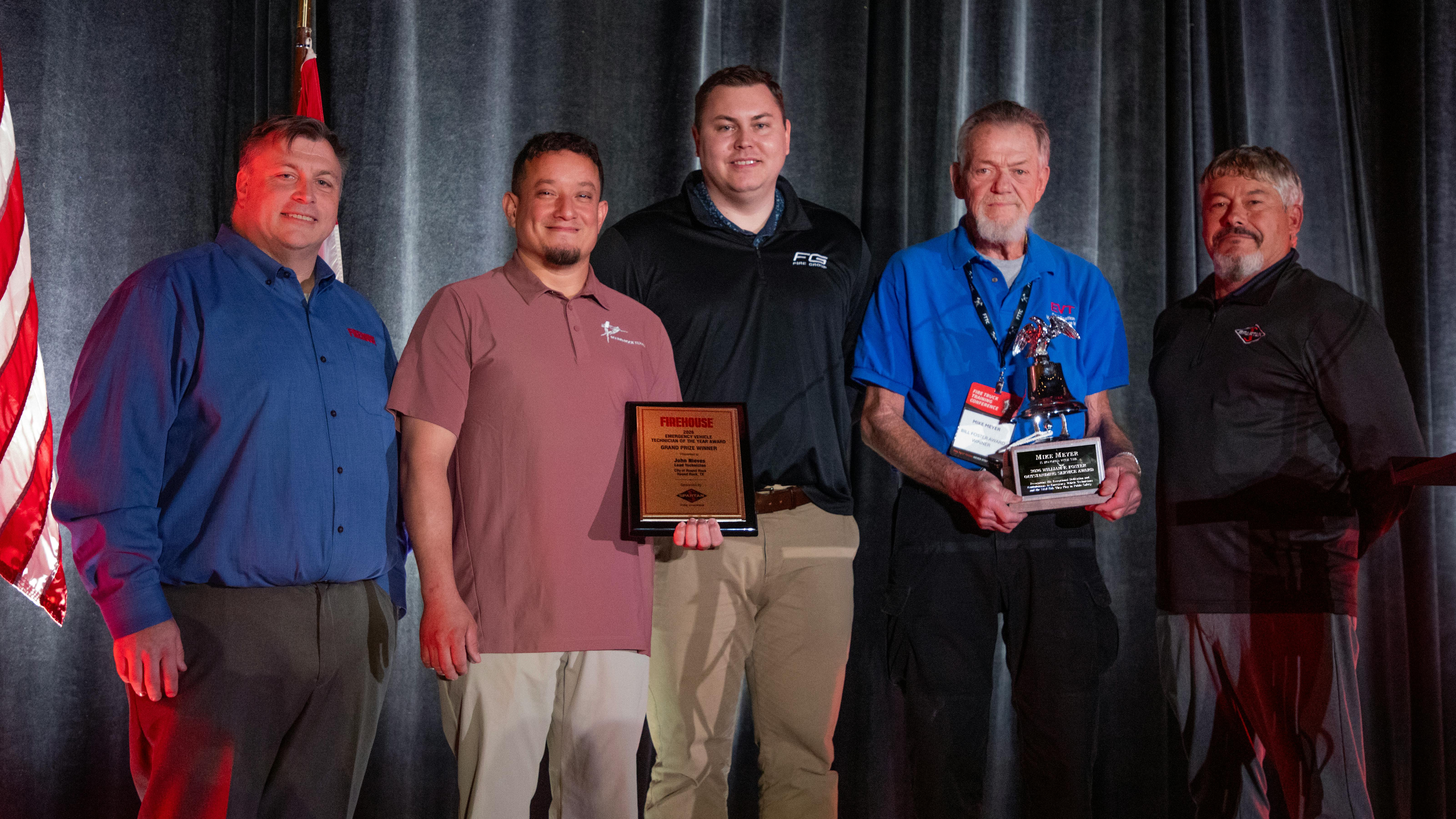 Firehouse Editor-in-Chief Peter Matthews (left to right); 2026 Emergency Vehicle Technician of the Year John Nieves of Round Rock, TX; Ransom Hall, director of inside sales for Spartan Emergency Group, Mike Meyer, recipient of the William F. Foster Award for Excellence and Jeff Seal, director of sales for Spartan Chassis.