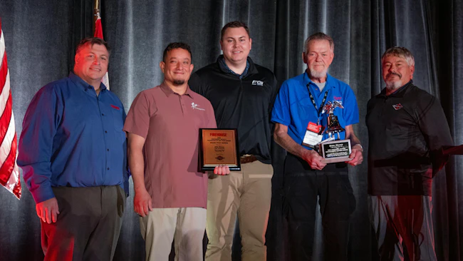 Firehouse Editor-in-Chief Peter Matthews (left to right); 2026 Emergency Vehicle Technician of the Year John Nieves of Round Rock, TX; Ransom Hall, director of inside sales for Spartan Emergency Group, Mike Meyer, recipient of the William F. Foster Award for Excellence and Jeff Seal, director of sales for Spartan Chassis.
