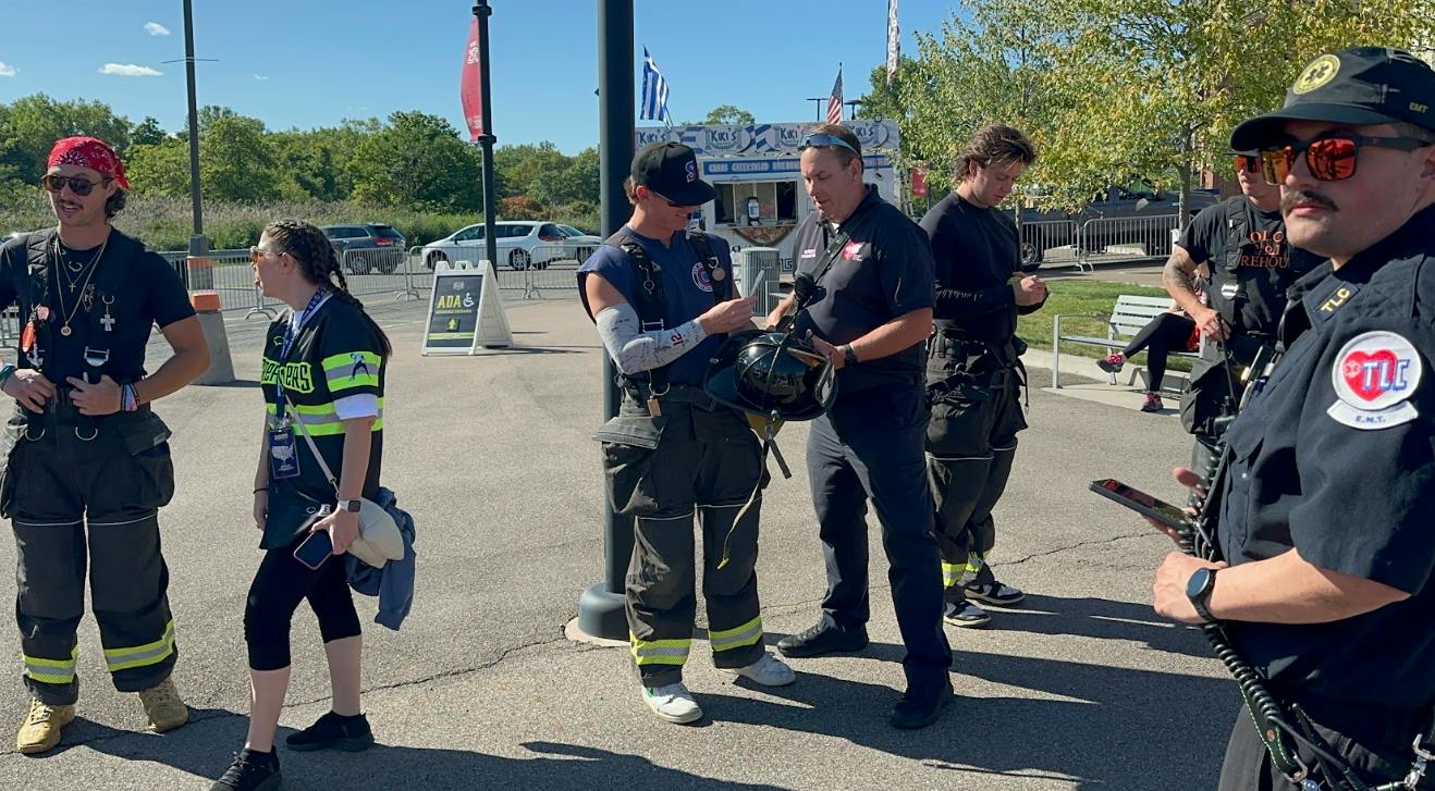 During the 'Plaza Party,' fans get to talk to players and have them sign gear, and they are also excited when actual firefighters approach them.