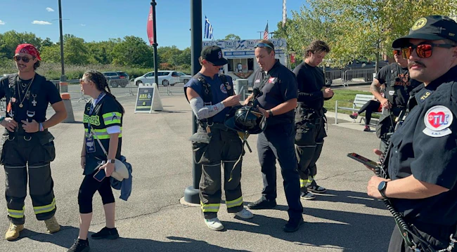 During the 'Plaza Party,' fans get to talk to players and have them sign gear, and they are also excited when actual firefighters approach them.