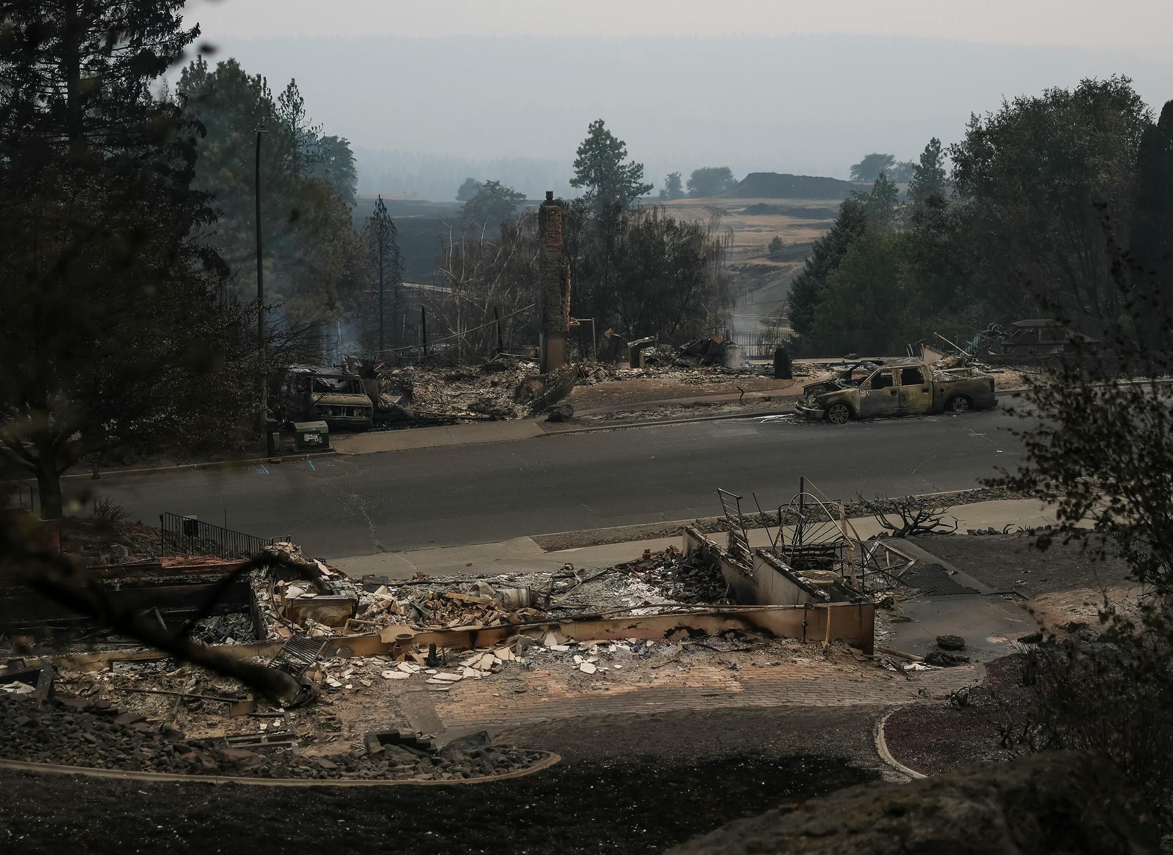 Wildfires destroyed 649 houses and damaged dozens of others.