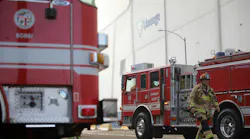 A Los Angeles Fire Department rig sits at a recent warehouse fire.